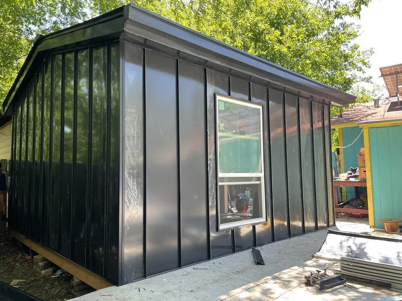 Black standing seam metal wall panels for Metal Roof Installation in Bellevue